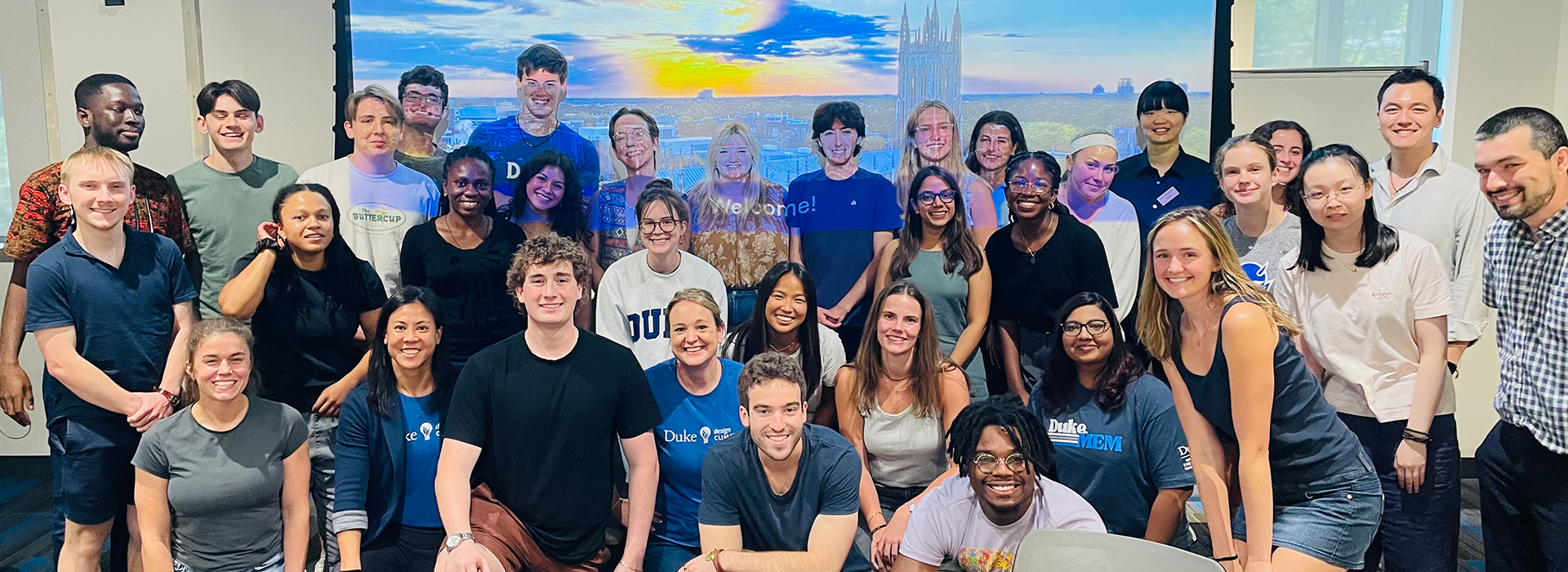 students in front of projector screen